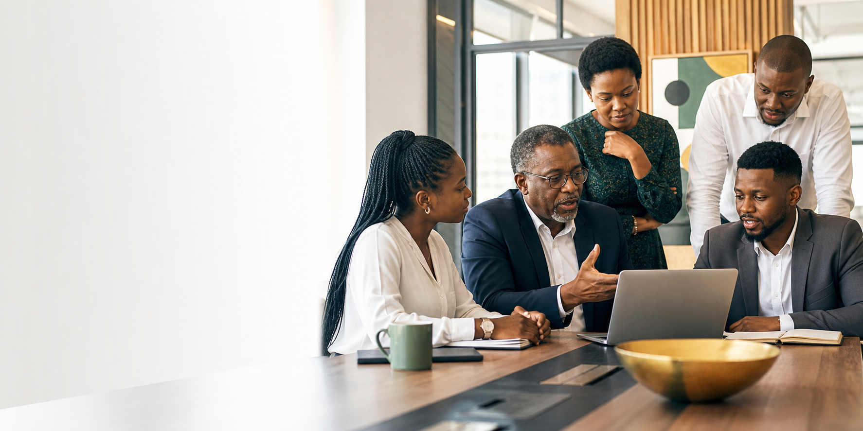 Senior African professionals advising a business team